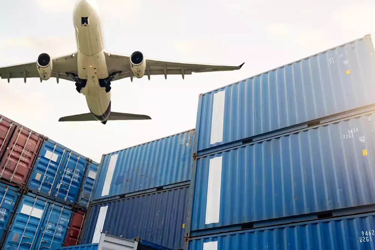 airplane flying over cargo